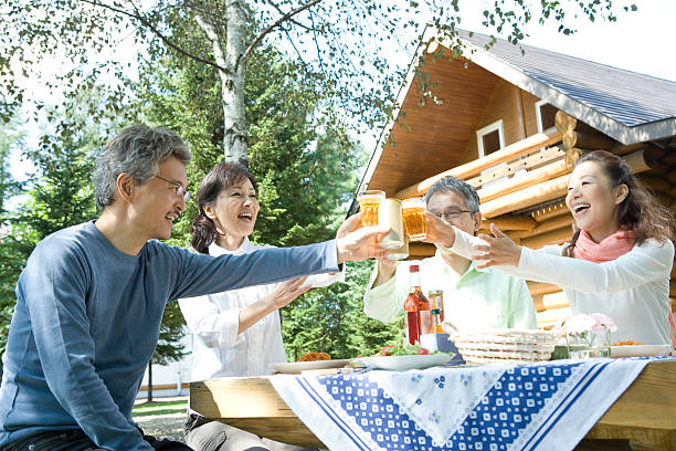 Two couples having a toast